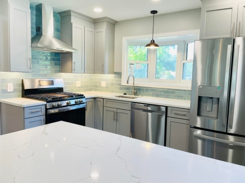  Gray Cabinets Quartz Countertop Stainless Steel Appliances Ocean Cerami Backsplash Tile Kitchen Remodel dRemodeling