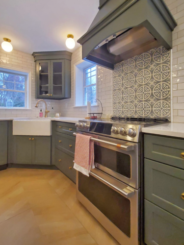  White Sink Range Hood Kitchen Island Kitchen Remodel Green Cabinets White Tile Accent Backsplash dRemodeling