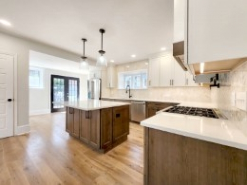 earthy wood white transitional kitchen island overhang